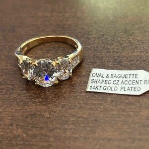 14kt GOLD PLATED RING, OVAL ⅜ Inch HIGH QUALITY CUBIC, LADIES SZ 7, 7 STONES